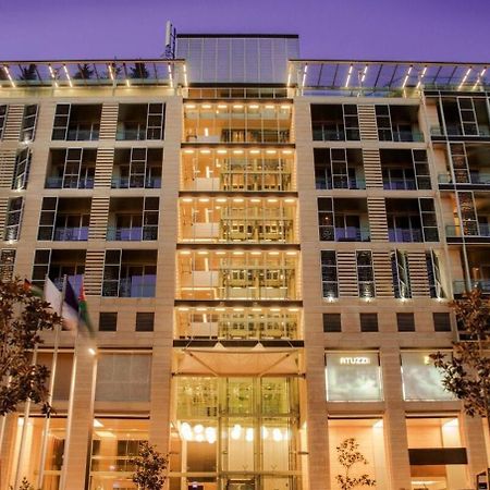 The Abdali Boulevard Hotel Amman Ngoại thất bức ảnh The hotel at night