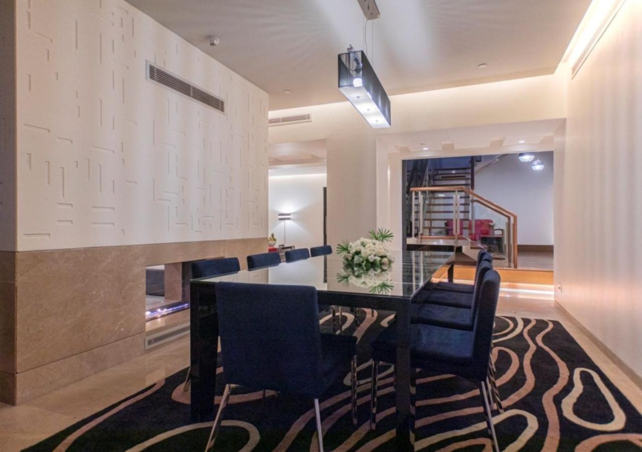 The Abdali Boulevard Hotel Amman Ngoại thất bức ảnh A modern dining room